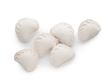 Raw dumplings (varenyky) on white background, top view
