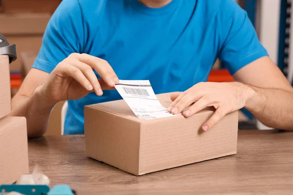 Post Office Worker Sticking Barcode Parcel Counter Indoors Closeup — Stock Photo, Image