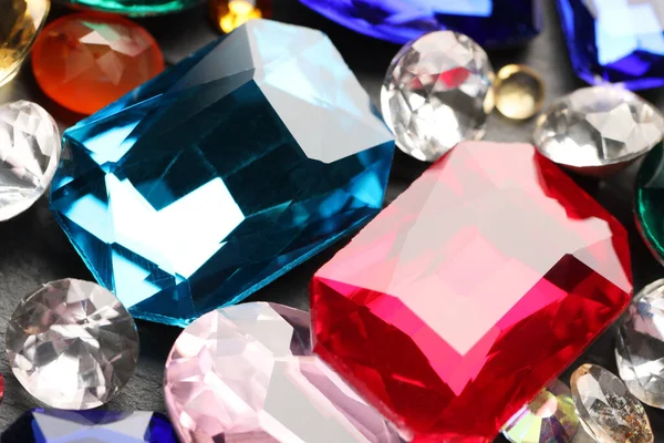 Different Beautiful Gemstones Jewelry Grey Background Closeup — Stock Photo, Image