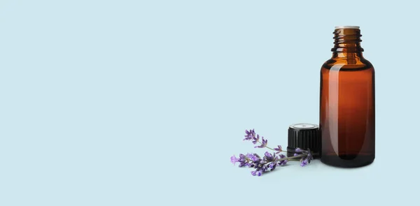 Bottle Lavender Essential Oil Flowers Pale Light Blue Background Space — Stock Photo, Image