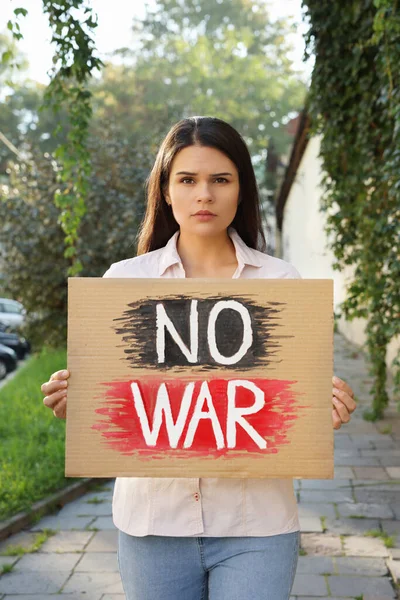 Sad Woman Holding Poster Words War Outdoors — Zdjęcie stockowe