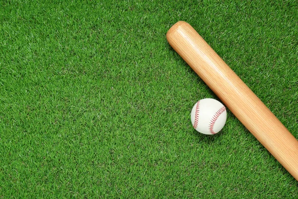 Wooden Baseball Bat Ball Green Grass Flat Lay Space Text — Stok fotoğraf