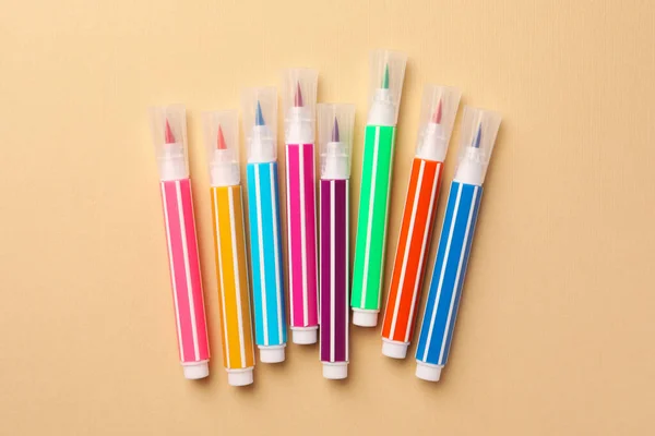 Many Bright Markers Beige Background Flat Lay — Stock fotografie