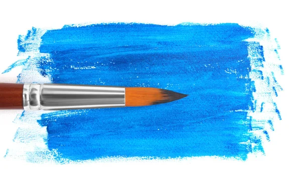 Mavi Boya Darbeleri Beyaz Arka Planda Fırça Üst Görünüm — Stok fotoğraf