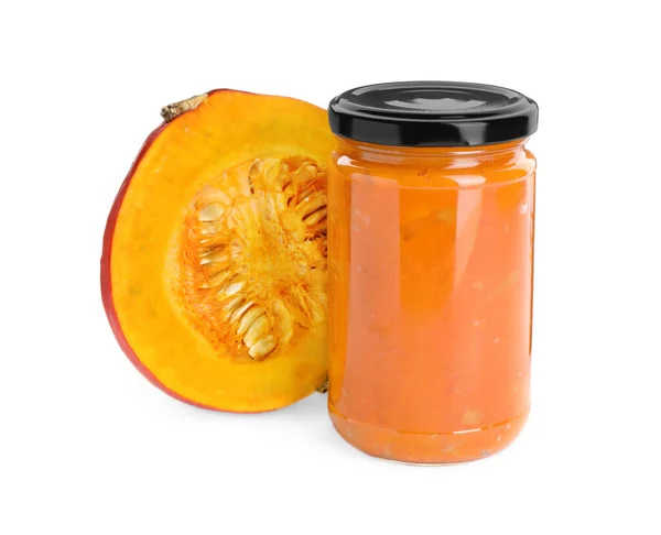 stock image Jar of pumpkin jam and fresh pumpkin on white background