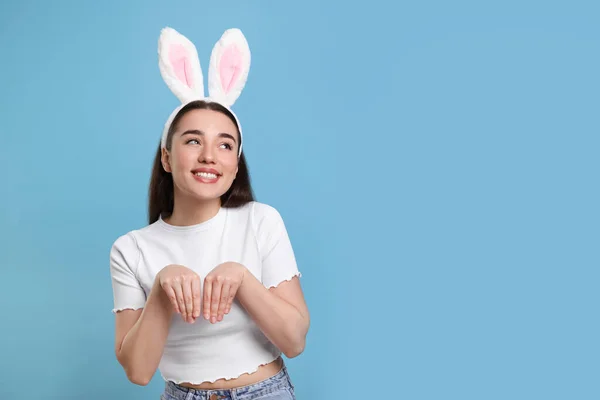 Happy Woman Wearing Bunny Ears Headband Turquoise Background Space Text — ストック写真