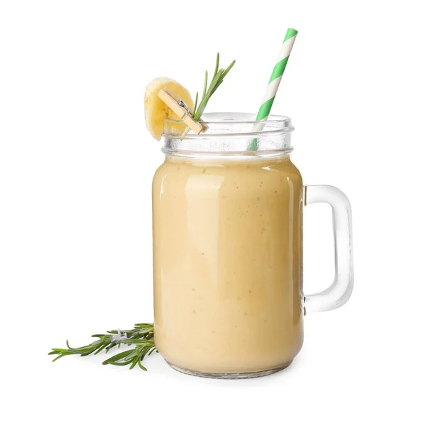 Mason jar of tasty banana smoothie with straw on white background