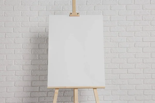 Wooden Easel Blank Canvas White Brick Wall Space Text — Stock Photo, Image