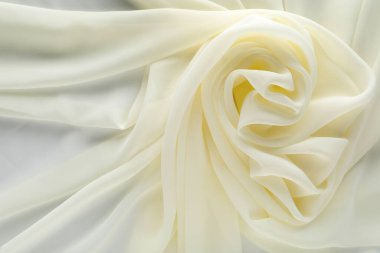 Arka plan olarak güzel beyaz tül kumaş, üst görünüm