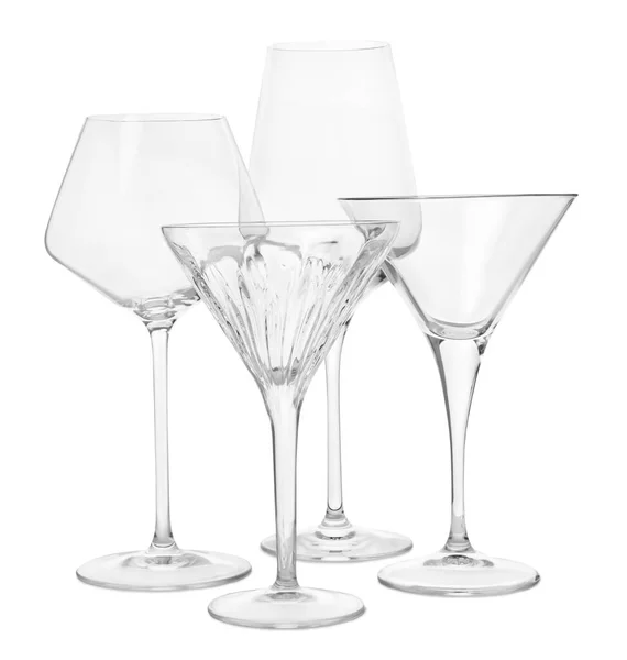 stock image Different elegant empty glasses isolated on white