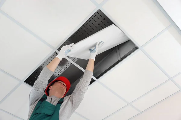 Suspended Ceiling Installation Builder Working Pvc Tile Low Angle View — Fotografia de Stock
