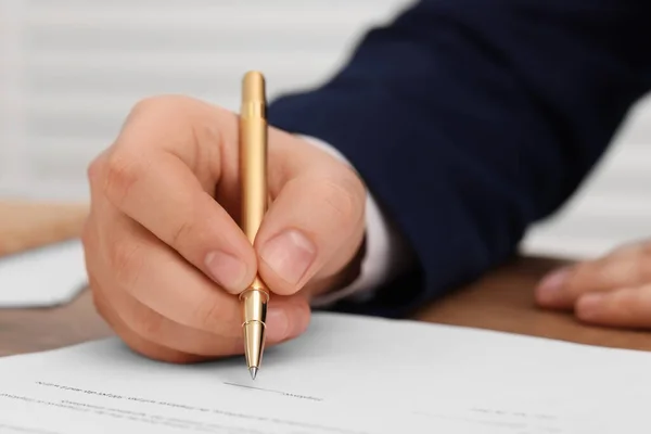 Man Signing Document Table Closeup View — ストック写真