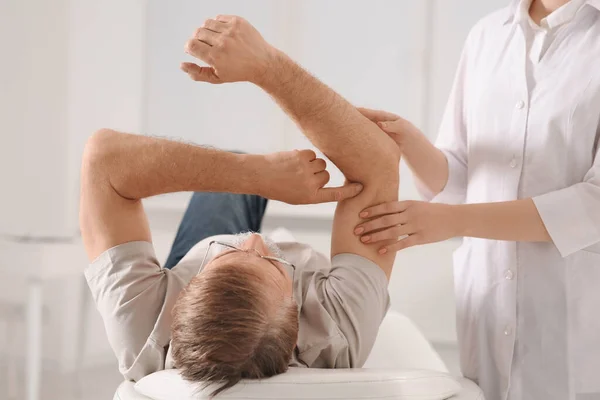 Professional Orthopedist Examining Patient Arm Clinic — Stockfoto