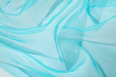 Arka plan olarak güzel turkuaz tül kumaş, yakın plan