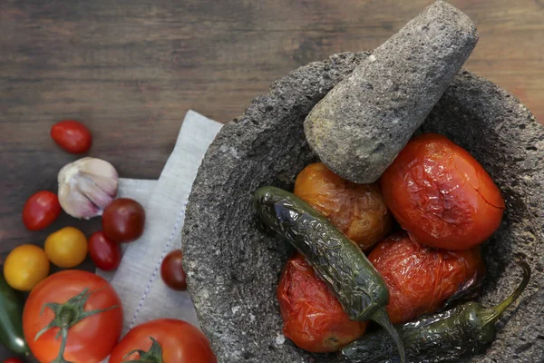 stock image Ingredients for tasty salsa sauce, pestle and mortar on wooden table, flat lay