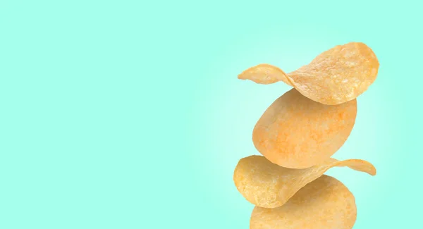 Stack Tasty Potato Chips Turquoise Background Space Text — Stock Photo, Image