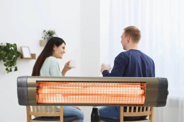 Couple Spending Time Room Modern Electric Infrared Heater Focus Appliance — Foto Stock