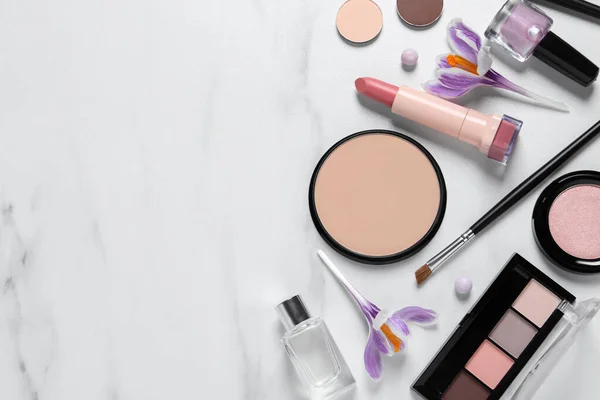 Flat Lay Composition Different Makeup Products Beautiful Crocuses White Marble — Stock Photo, Image