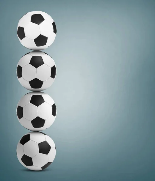Hromada Fotbalových Míčků Zaprášeném Světle Modrém Pozadí Mezera Pro Text — Stock fotografie