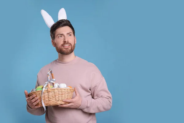 Happy Man Cute Bunny Ears Headband Holding Wicker Basket Easter — Stock Photo, Image