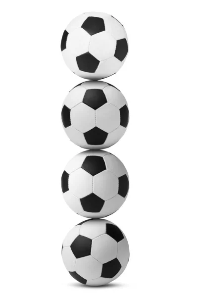 Stapel Von Fußballbällen Auf Weißem Hintergrund — Stockfoto