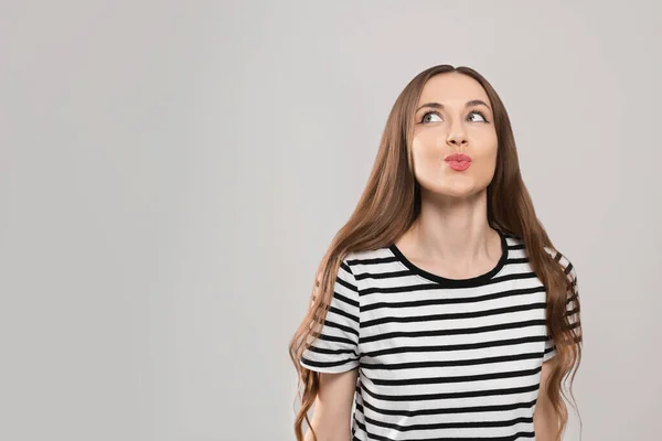 Beautiful Young Woman Blowing Kiss Light Grey Background Space Text — Stock Photo, Image