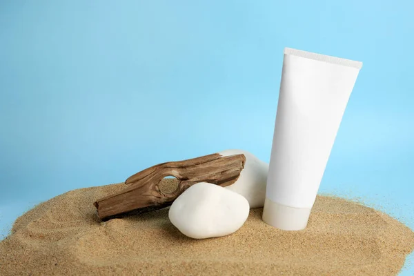 Tube Cream Stones Bark Sand Light Blue Background Cosmetic Product — Stock Photo, Image