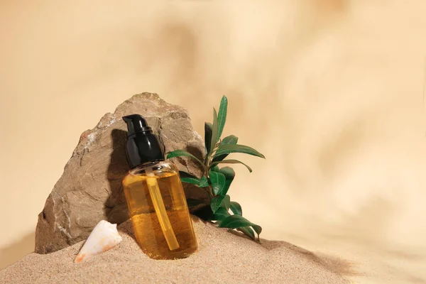 Bottle Serum Stone Green Leaves Sand Beige Background Space Text — Stock Photo, Image