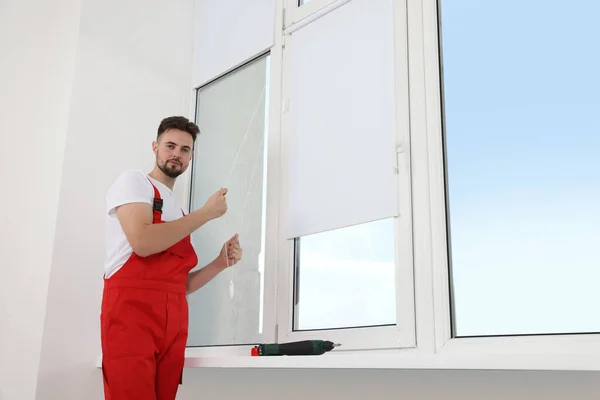 Worker Uniform Opening Roller Window Blind Indoors — Stock Photo, Image
