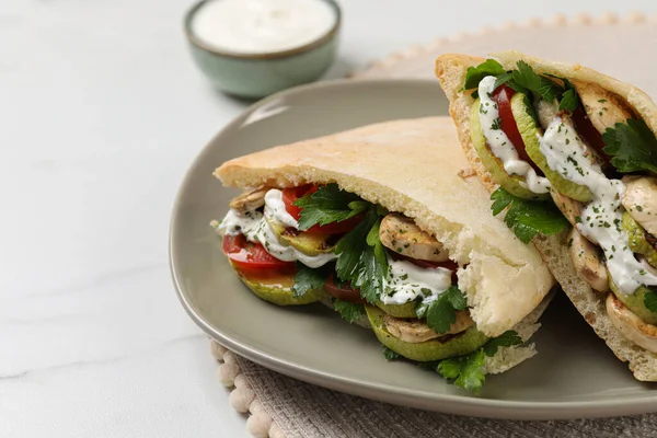 Delicious Pita Sandwiches Grilled Vegetables Sour Cream Sauce White Table — Stockfoto