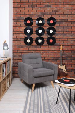 Living room decorated with vinyl records. Interior design clipart