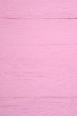 Arkaplan olarak pembe ahşap yüzey dokusu, yakın plan