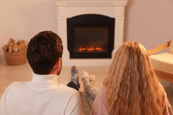 Lovely Couple Spending Time Together Fireplace Home Back View — Φωτογραφία Αρχείου