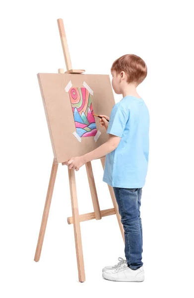 Маленький Мальчик Рисует Белом Фоне Использование Мольберта Холста — стоковое фото