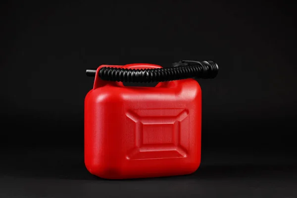 Röd Plastbehållare Svart Bakgrund — Stockfoto
