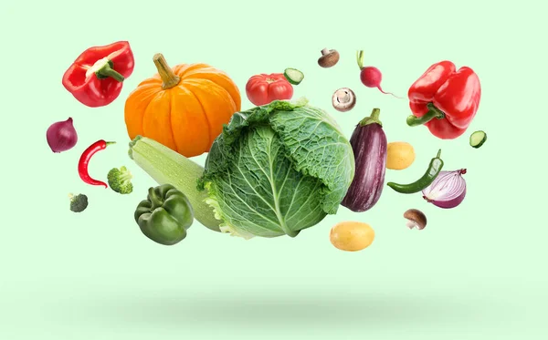 Many Different Fresh Vegetables Falling Pale Light Green Background — Stock Photo, Image