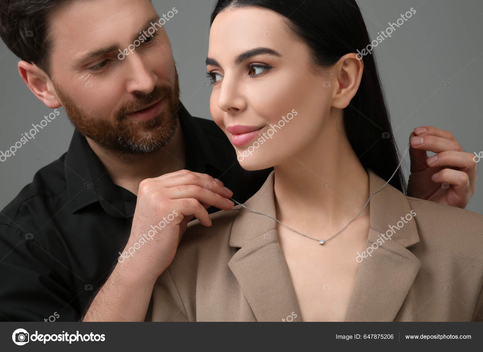 Man Putting Elegant Necklace Beautiful Woman Dark Grey Background