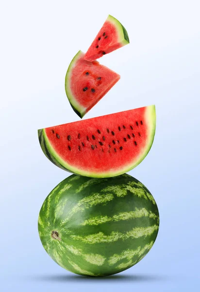 Collage with cut and whole watermelons on light blue gradient background