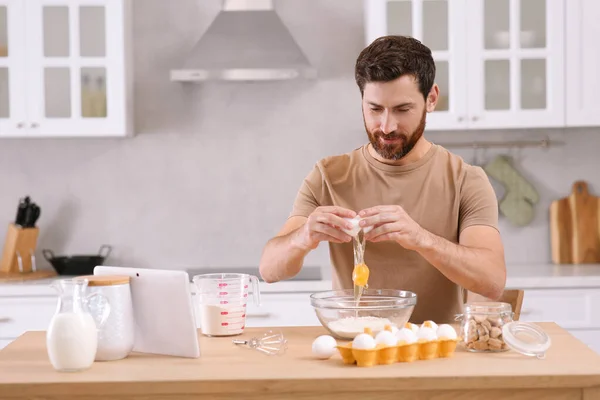 Man Making Dough While Watching Online Cooking Course Tablet Kitchen — Stock Photo, Image