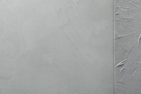 背景としての薄い灰色のテクスチャの表面 トップビュー — ストック写真