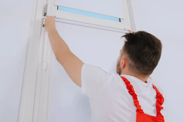 Professional Worker Installing Roller Window Blind Indoors — Stock Photo, Image