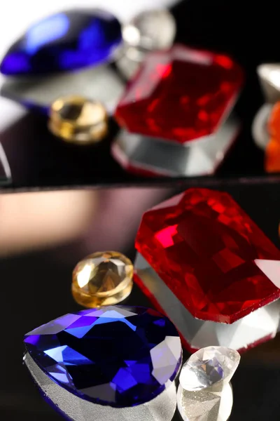Different Beautiful Gemstones Jewelry Mirror Surface — Stock Photo, Image