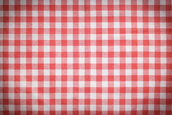 背景として赤と白のテーブルクロス ビネット効果 — ストック写真