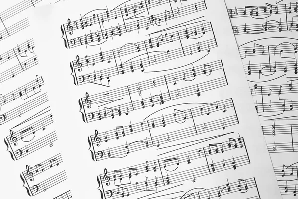 Простыни Мелодии Написанные Различными Музыкальными Символами Фон Крупный План — стоковое фото