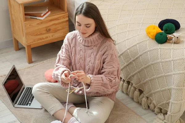 Stock image Woman learning to knit with online course at home, space for text. Handicraft hobby