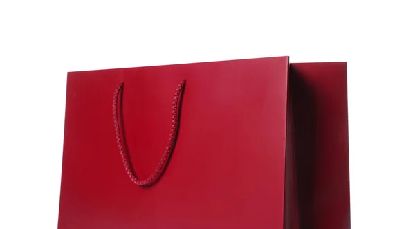 白色背景的深红色礼品袋 — 图库照片