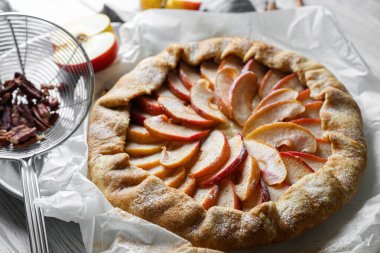 Delicious apple galette on table, closeup view