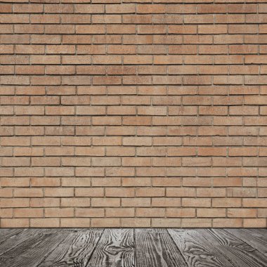 tuğla duvar ve ahşap yerde Oda