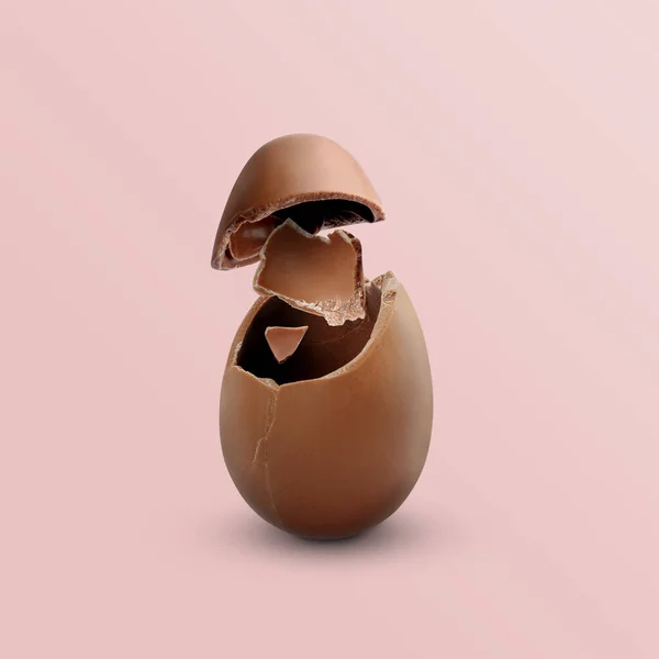 Εκρηκτικό Αυγό Σοκολάτας Γάλακτος Ανοιχτό Ροζ Φόντο — Φωτογραφία Αρχείου