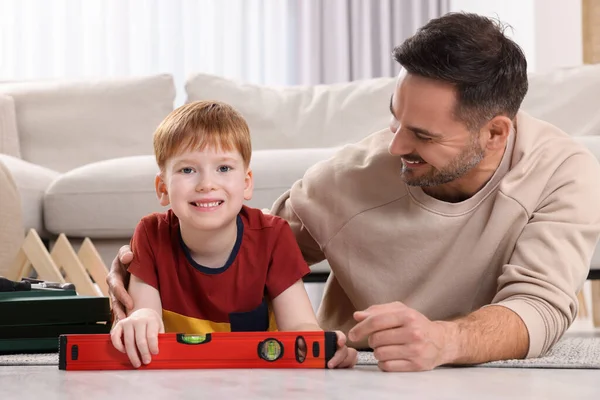 Father Son Bubble Level Home Repair Work — Stock Photo, Image